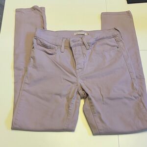Levi’s 311 women’s jeans, size 27. Blush Pink/Purplish color.